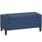 Blue button-tufted upholstered ottoman bench with hinged lift top and tapered legs