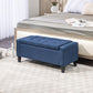Dark blue lift-top storage ottoman bench with tufted cushion top and dark legs