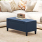 Dark blue upholstered lift-top storage ottoman bench with button tufting and short legs