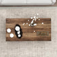 Wood tabletop with dark storage door and retro handle on a gray coffee table