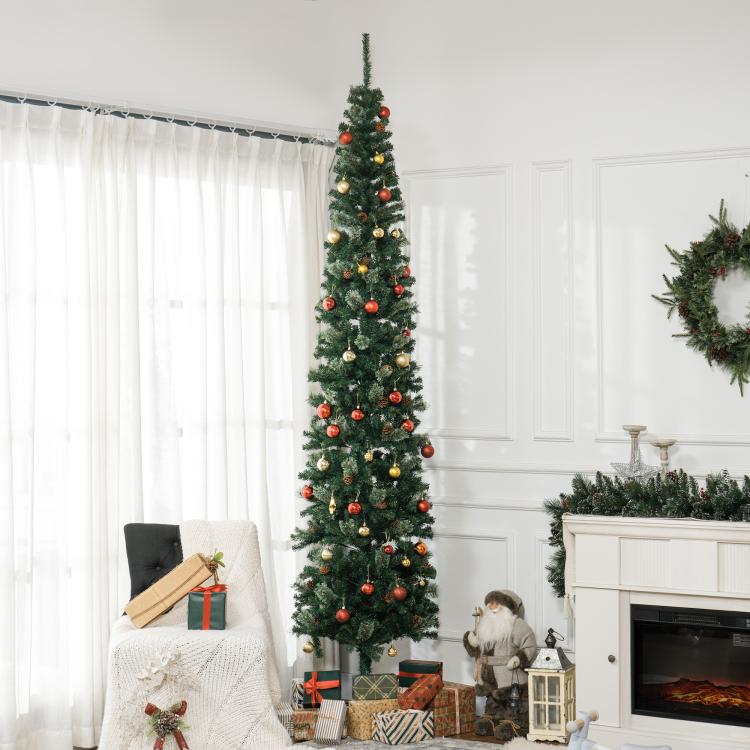 Slim 9.5 ft artificial Christmas tree, green with ornaments and lights, on metal stand