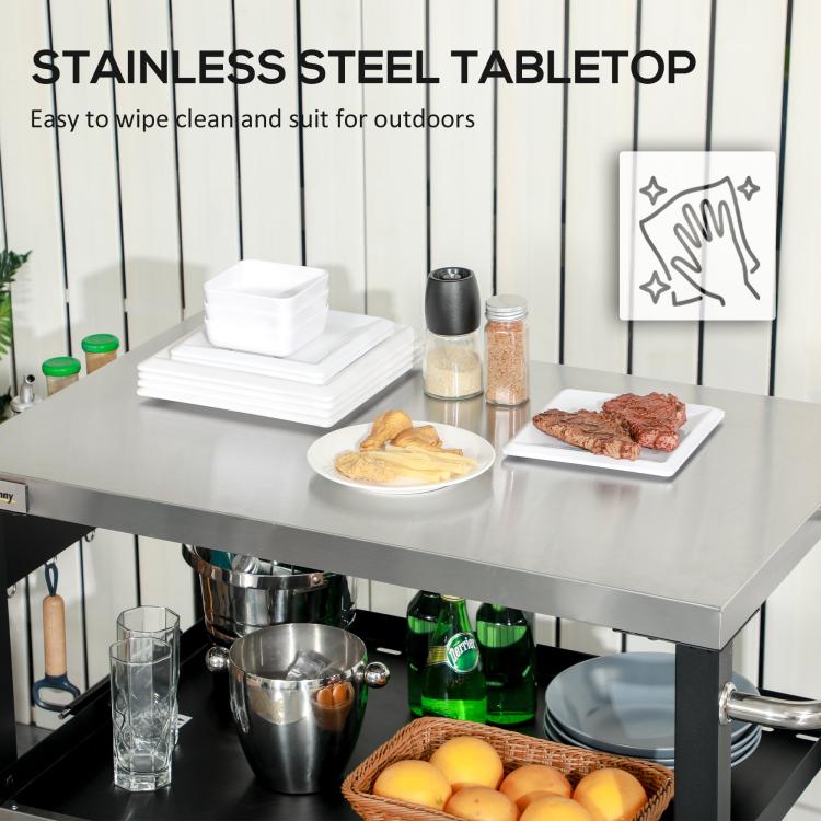 Stainless steel tabletop on black grill cart with side prep shelf and open storage