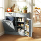 Gray farmhouse kitchen cabinet with open side shelves and tilt-out hidden trash can compartment.