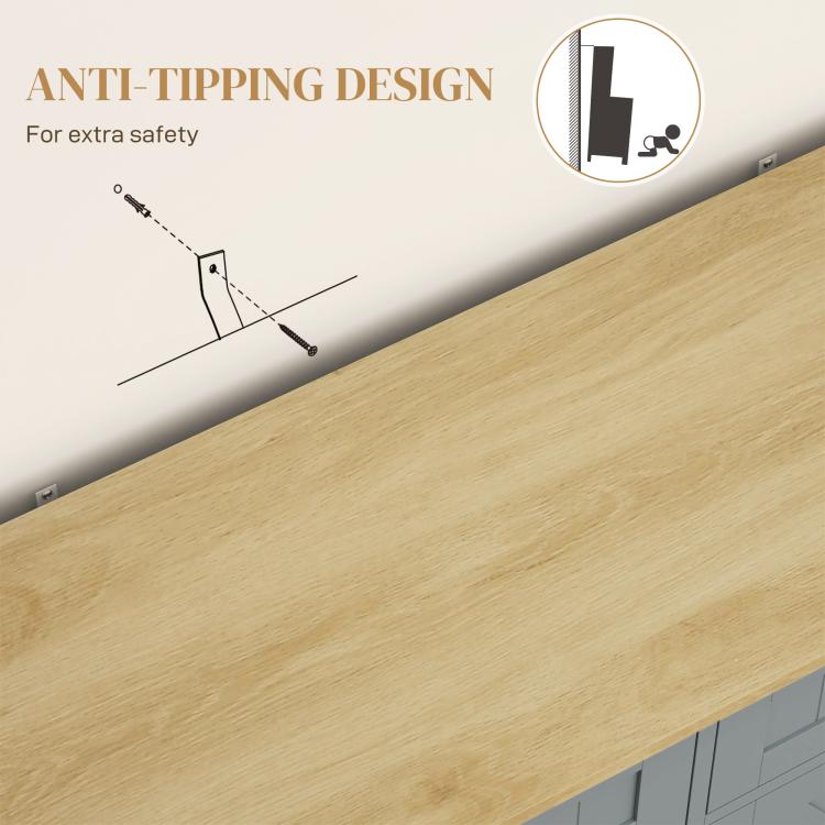 Cabinet anti-tipping bracket near countertop edge, mounted to wall for extra stability.