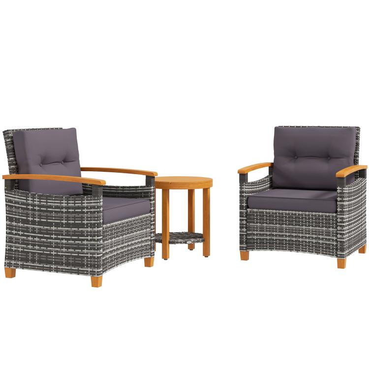 Outdoor bistro set: two gray cushioned wicker armchairs with wooden frames