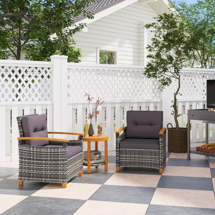 Outdoor bistro set: gray cushioned wicker chairs with round wood side table