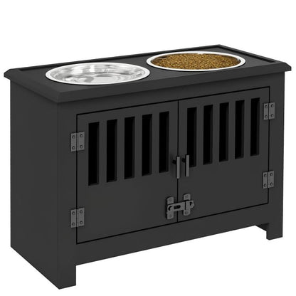 Black pet food storage cabinet with two stainless steel bowls on top and slatted front