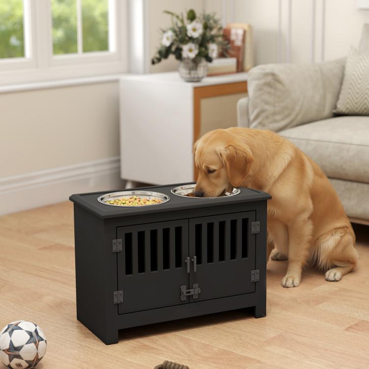 Black dog feeding cabinet with two stainless bowls, slatted front, and closed storage doors