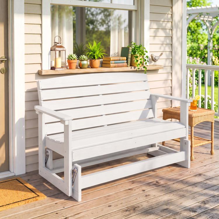 White slatted rocking bench chair on outdoor porch with wide seat and back