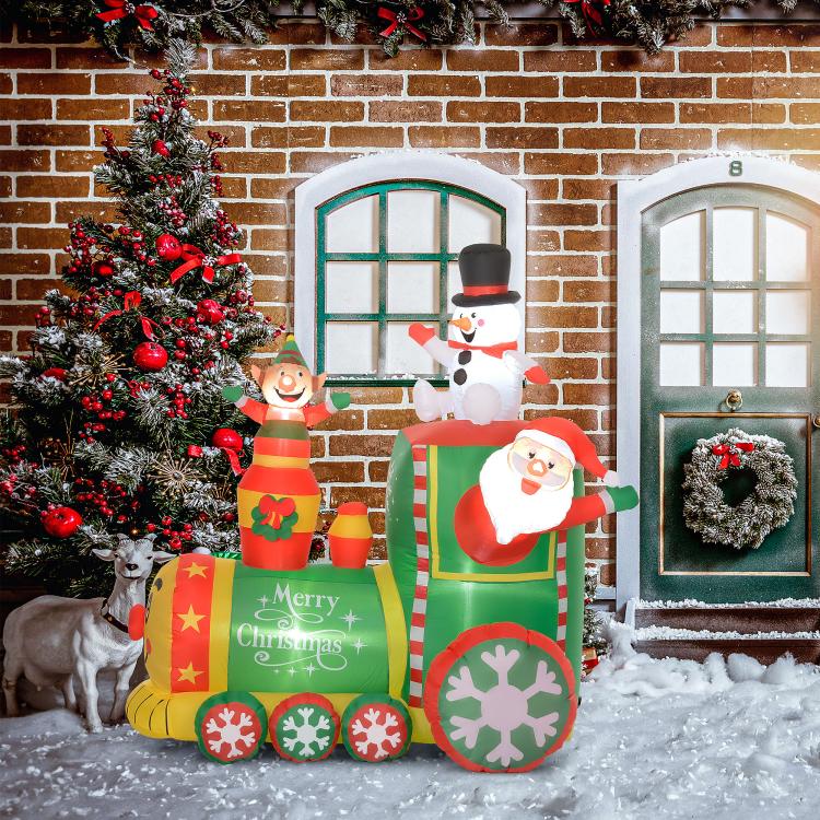 Inflatable Christmas train with Santa snowman and elf figures on green and red cars