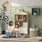 Light wood kids storage bookshelf with open shelves, toys, and lower cabinet doors