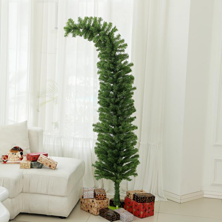 Green pencil artificial Christmas tree with flat metal base and tiered dense branches