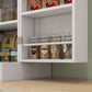 White kitchen pantry cabinet with open shelves and doors, storing jars and canisters