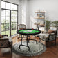Round poker table with green felt on black legs, near upholstered seating