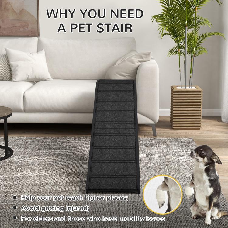 Black pet stair ramp with non-slip carpet, small dog standing beside it