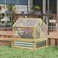 Raised wooden flower bed with greenhouse topper and clear mesh side panels