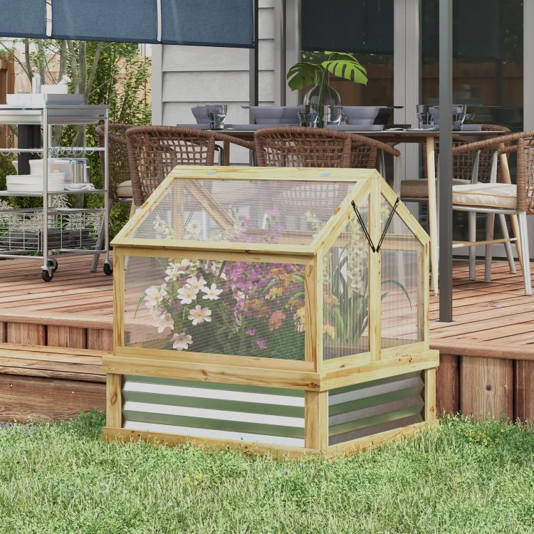 Raised wooden flower bed with greenhouse topper and clear mesh side panels