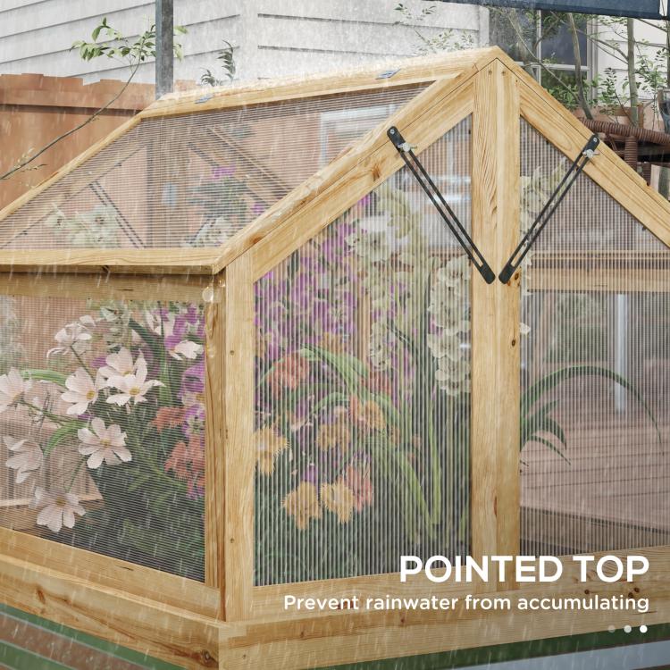 Natural wood greenhouse cold frame with pointed lid and clear mesh enclosure