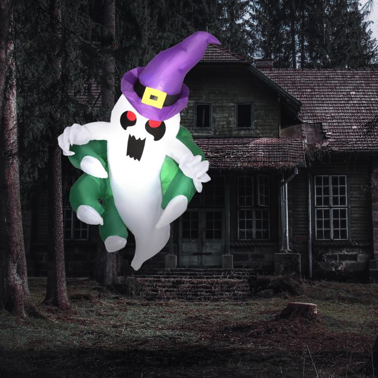 Inflatable ghost yard decoration with purple witch hat and green outfit, front view