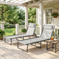 Outdoor pair of folding chaise lounge chairs with gray fabric, black frame, head pillows