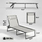 Folding chaise lounge chair with gray cushion, black bungee straps, adjustable back