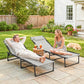 Pair of folding chaise lounge chairs with gray cushions and black bungee seating, reclined