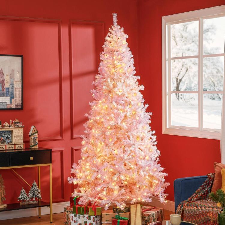 Pink pre-lit artificial Christmas tree with warm white LED lights, dense branches