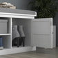 White entryway shoe storage bench with gray cushioned top; open cabinet doors reveal shelves