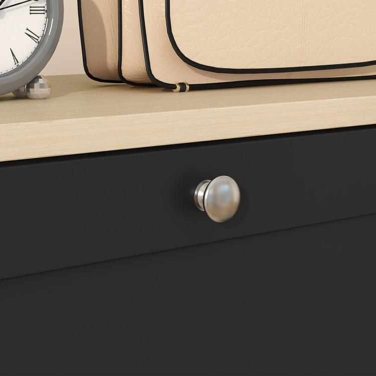 Black shoe storage cabinet drawer with round metal knob and flat front panel