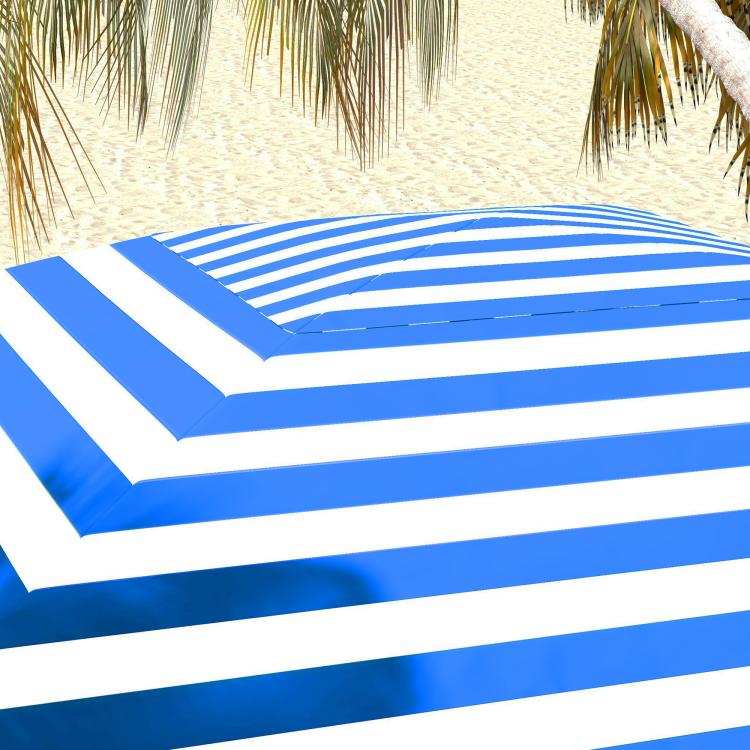 Blue and white striped cabana umbrella canopy close-up