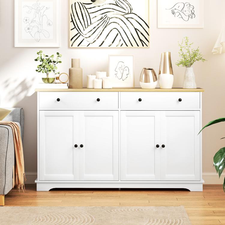 White sideboard cabinet with light wood top, four doors, and two storage drawers