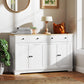 White sideboard cabinet with light wood top and four cabinet doors for storage