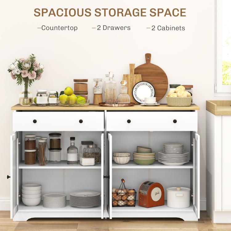White sideboard cabinet open to show drawers and shelves with storage compartments
