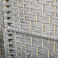 Close-up of gray woven privacy screen texture with light wood battens