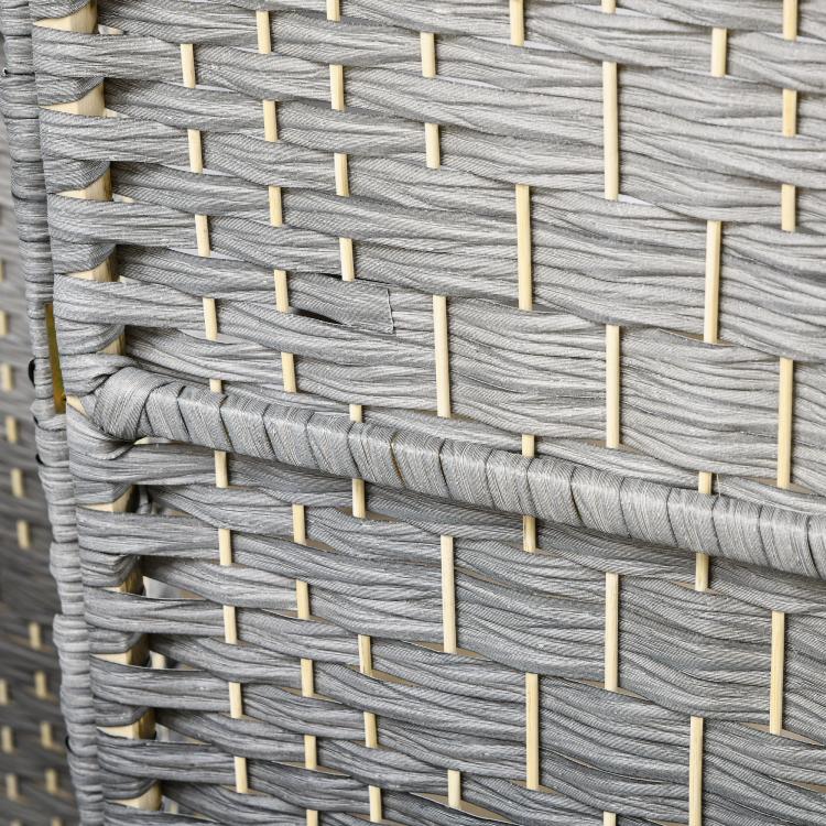 Close-up of gray woven privacy screen texture with light wood battens