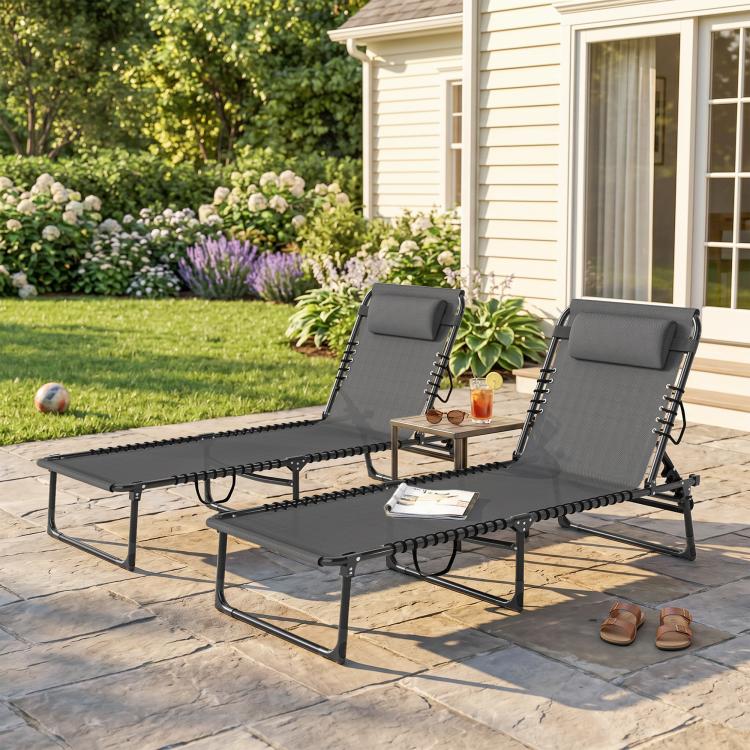 Gray 4-position folding chaise lounge chairs with padded headrests and mesh bungee seats