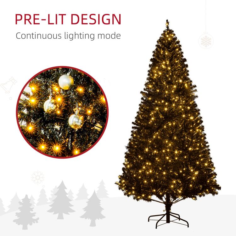 Pre-lit artificial Christmas tree with warm white LED lights, dense dark green branches