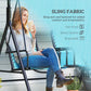2-person blue porch swing showing sling fabric seat and backrest, with person seated