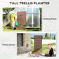 Tall trellis planter with light brown slatted screen for climbing plants
