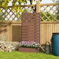 Light brown trellis planter panel beside yard fence with flower-filled raised bed