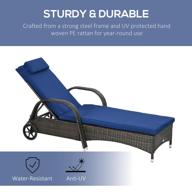 Reclining chaise lounge with blue cushion and dark wicker frame, padded headrest