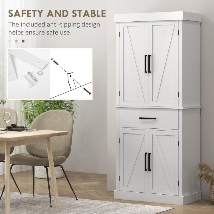 White tall cabinet with anti-tipping design, barn doors, and black handle accents