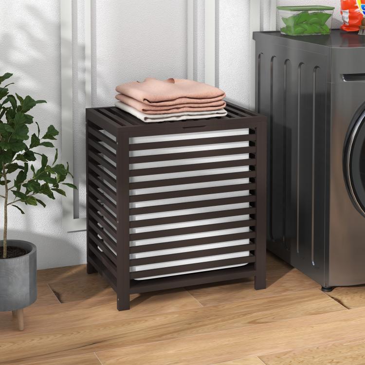Coffee bamboo laundry hamper with lid open, holding folded towels on top