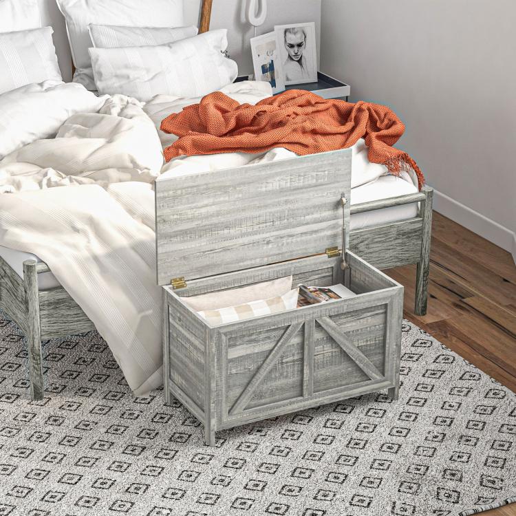Gray lift-top storage chest open with cross-panel front and safety hinge