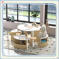 Children’s play table set with under-table storage and two round chairs, light wood