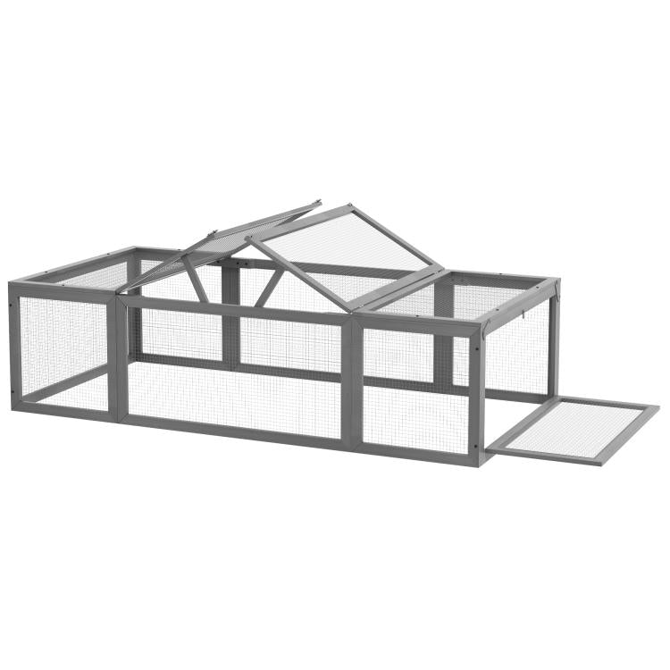 Gray rabbit hutch with wire-mesh panels and attached ramp platform, open side view