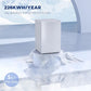 White mini fridge standing on protective packaging, compact appliance with smooth front