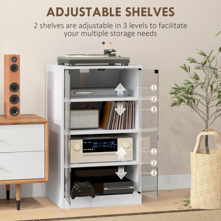 White media cabinet interior with adjustable shelf levels behind clear tempered glass