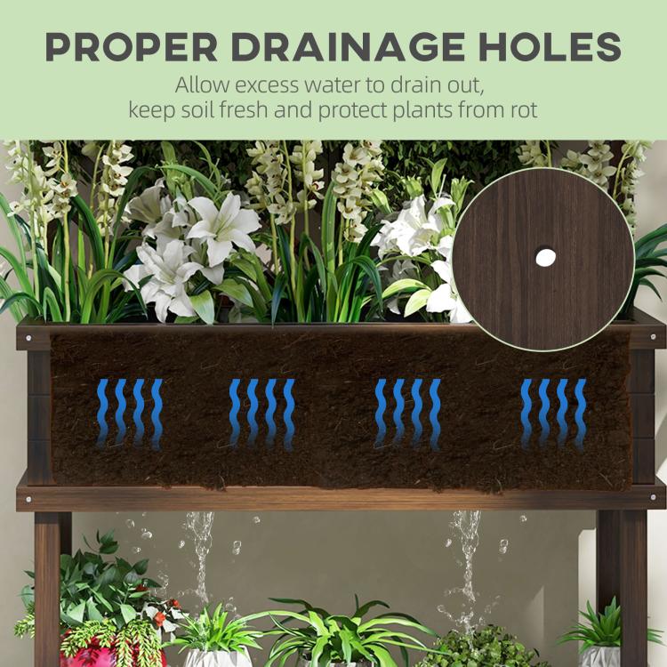 Raised planter with drainage holes under the soil, dark wood planter box
