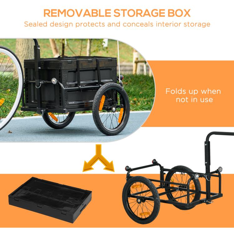 Removable storage box for bicycle cargo trailer, black bin next to folded trailer